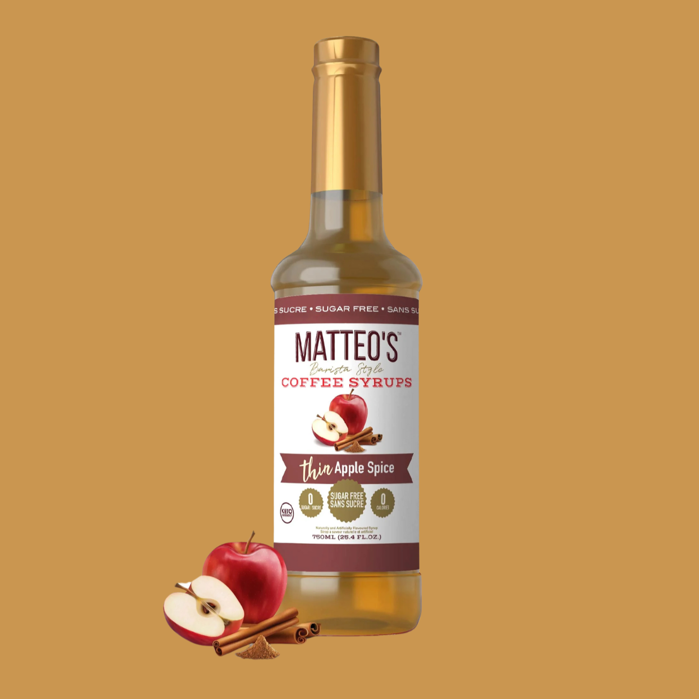 Bouteille de sirop pour café Matteo’s saveur pomme épicée, format 750 ml. Étiquette blanche avec illustration de pommes et de bâtons de cannelle. Produit sans sucre, compatible avec le régime keto et faible en calories. Idéal pour aromatiser cafés et cocktails.