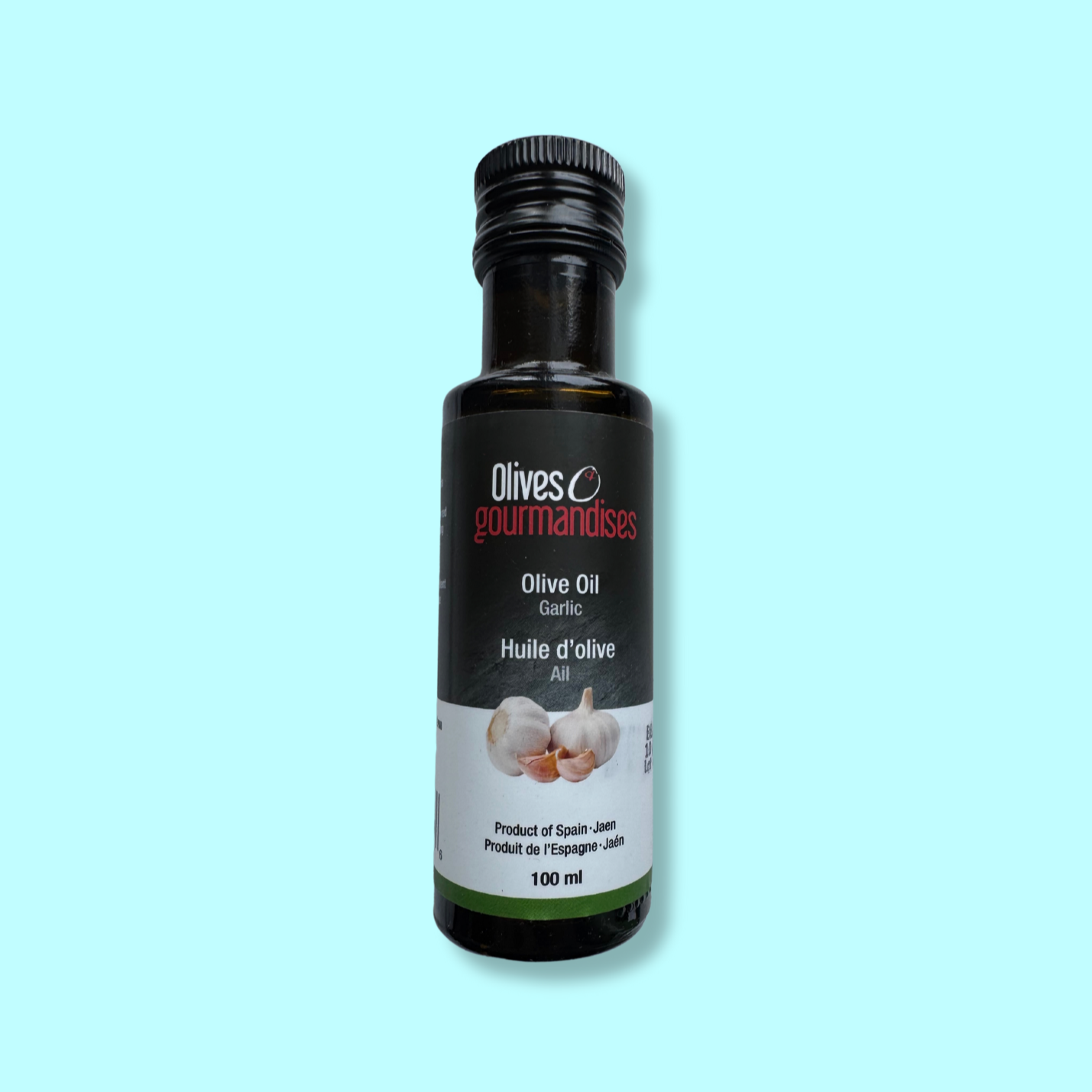 Bouteille de 100 ml d'huile d'olive à l'ail de la marque Olives et Gourmandises. Produit artisanal originaire de Jaén, Espagne. Parfaite pour rehausser les pâtes, viandes, légumes et sauces avec une saveur d'ail délicatement infusée.